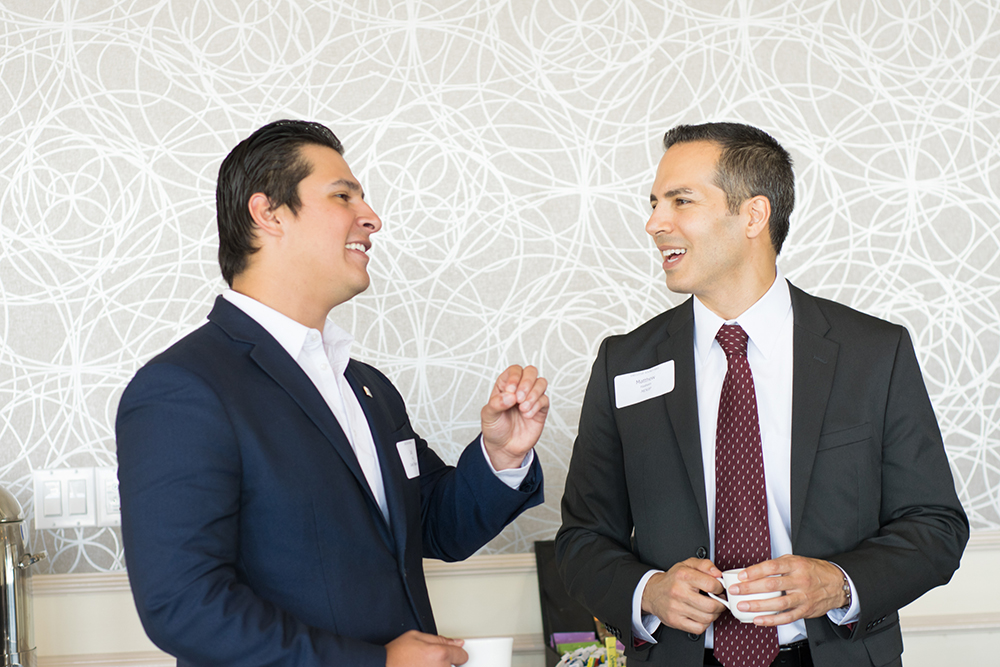 Juan Rios of Gravity IT talks with panelist Matthew Hashem of MDVIP before the roundtable discussion