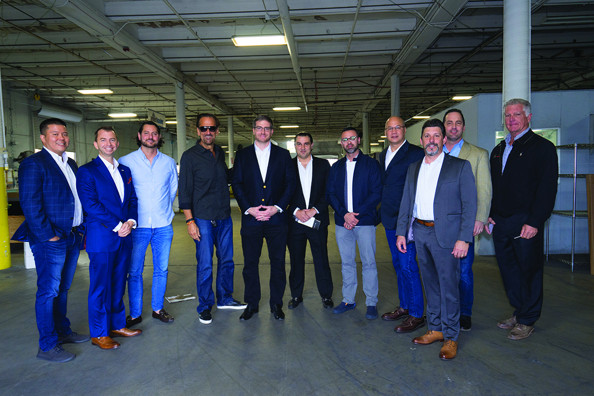 Panelists toured the manufacturing and warehouse facilities of host Amerikooler, which makes walk-in coolers in Hialeah