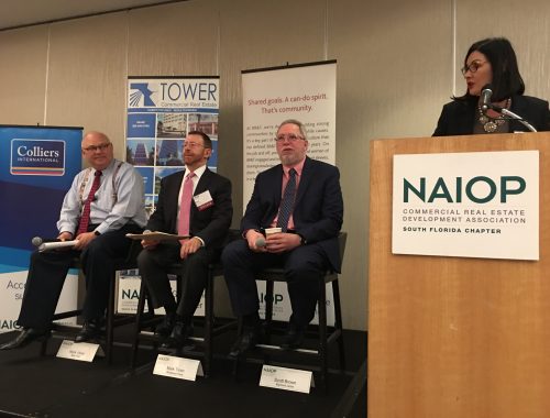 NAIOP Panelists Mark Vitner, Mark Troen and Scott Brown with NAIOP President and moderator Darcie Lunsford