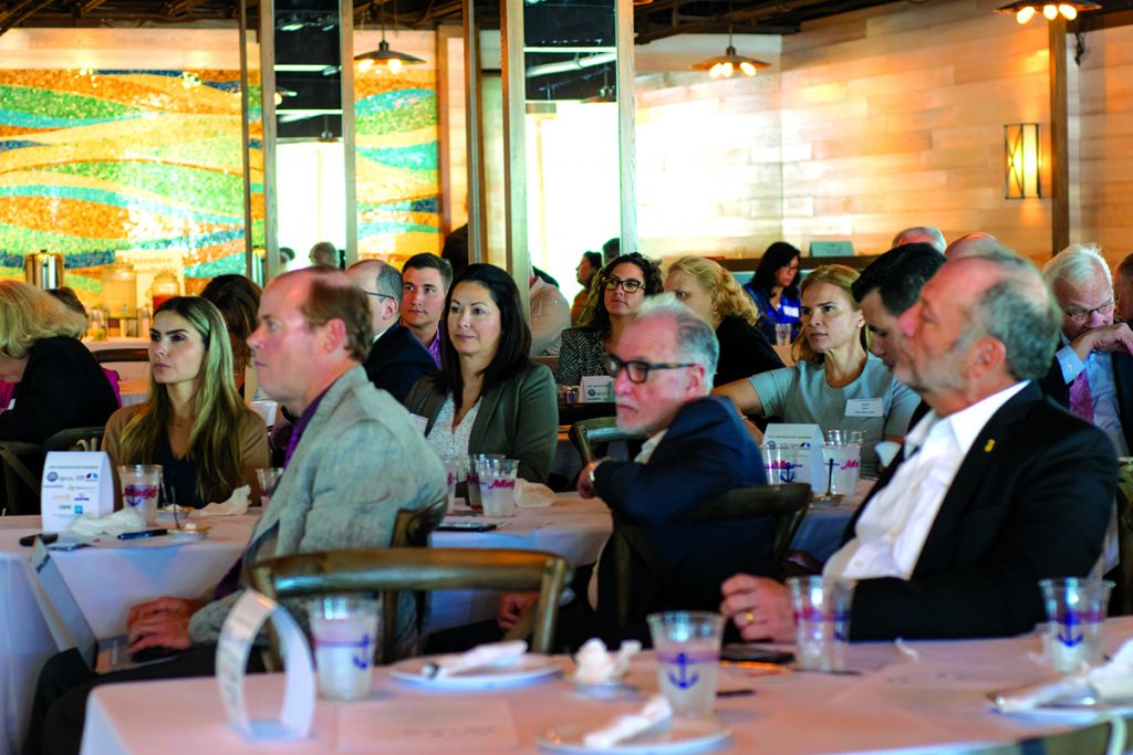 Audience watches the presentation