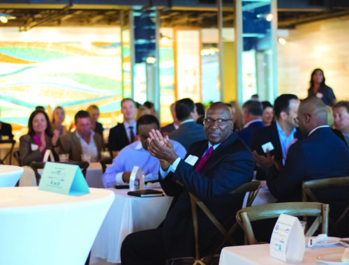 Members of the audience applaud during South Florida Executive Roundtable’s presentation