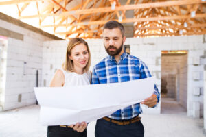 Young,Couple,At,The,Construction,Site.